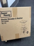 Super Handy Electric Garden Mulcher Shredder GU0056 Brown Cardboard. Fixed Price $210.00.