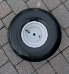 Troy-bilt Super Bronco Rear Tire & Wheel Rim 13AX60TG766. Fixed Price $48.95.
